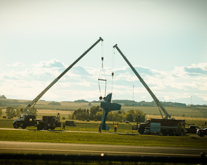 Two McIntyre Cranes hoisting an aircraft